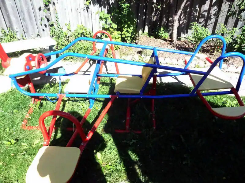 Gallery 8 Brightly colored playground equipment for kids at Diana Daycare in Newmarket.