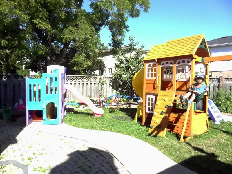 Gallery 9 Colourful outdoor playground with slides and climbing structures for kids.